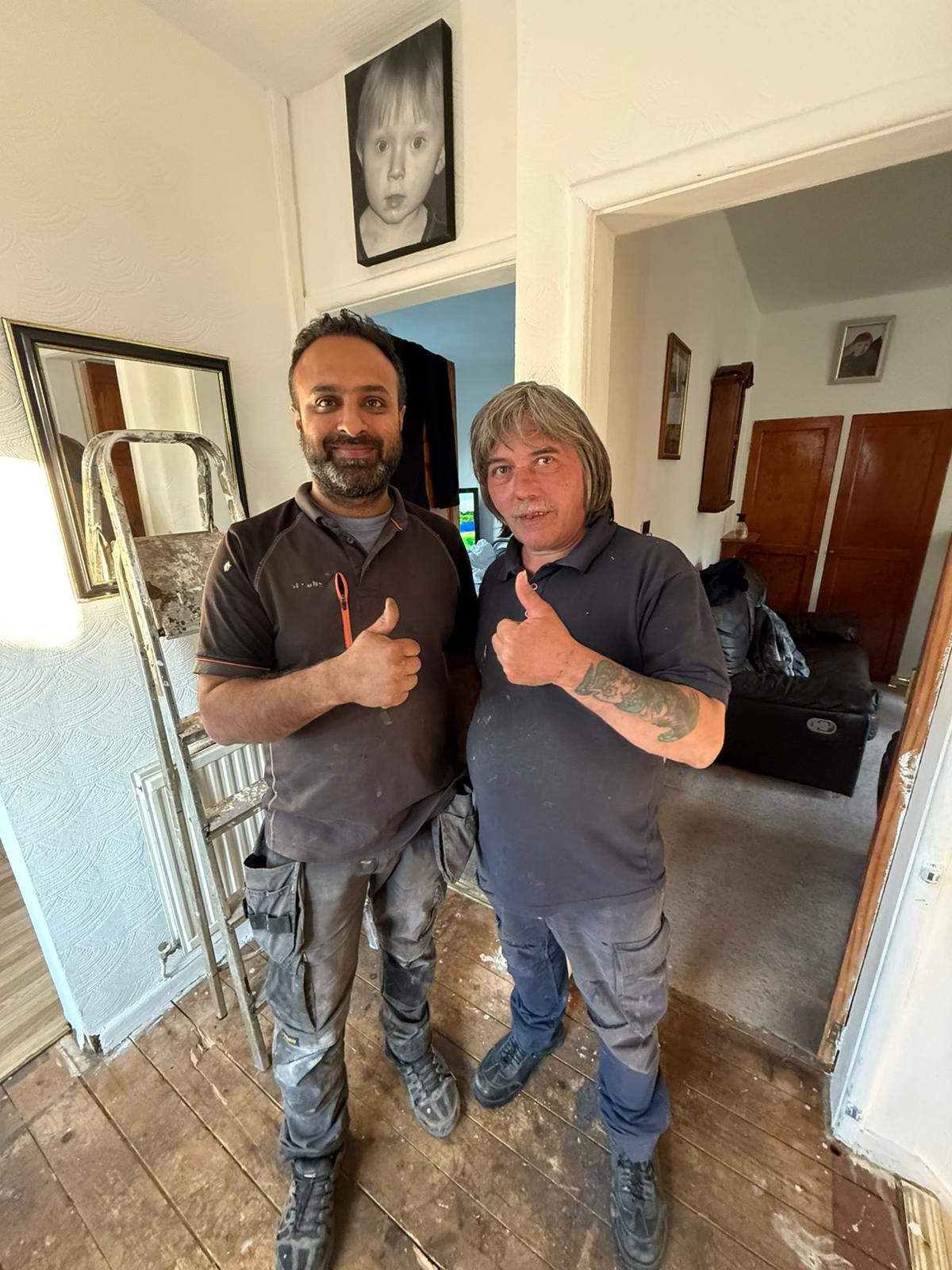 Emergency Boilers engineer with happy customer after boiler repair service in Leeds